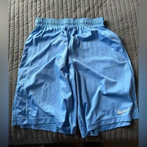 Blue Nike athletic shorts in size large NEW (no pockets)